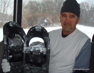 Riding a bus with Bob in 2009 for Cindy Brochman's last snowshoe race at the Snowshoe Shuffle