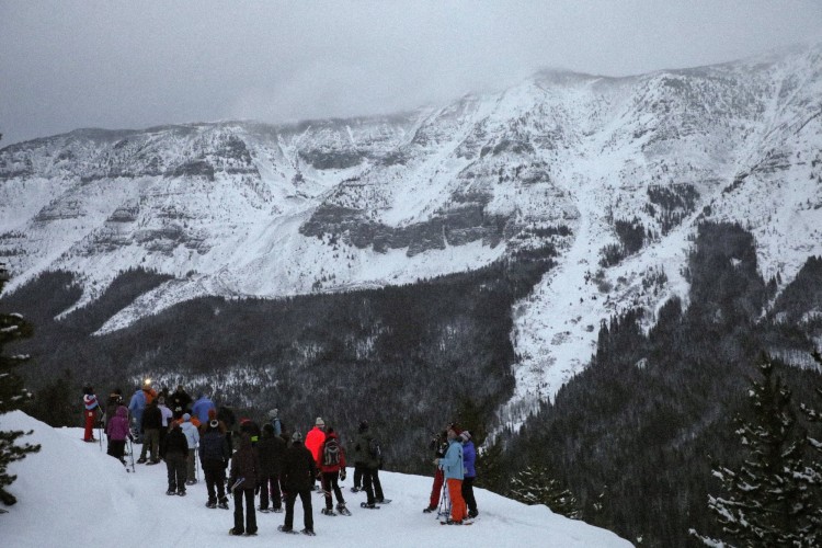 group of snowshoers on Last Tracks snowshoe tour