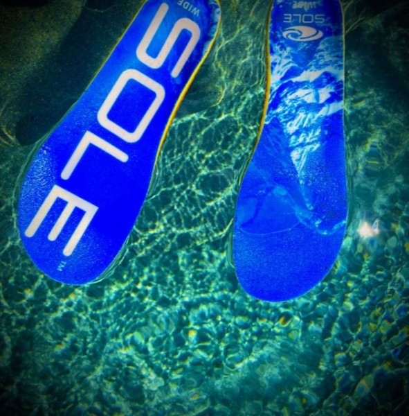 sole insole footbeds sitting on top of water