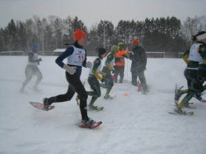 The women in a pack after the first 100 m. of the 400 m. race.