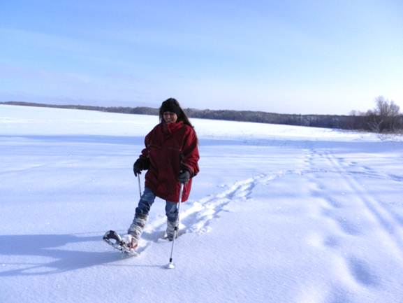 Snowshoeing along the Big Eau Pleine Reservoir in the flatlands of Wisconsin.