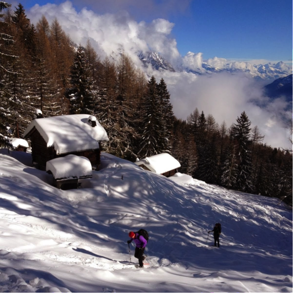 Snowshoeing past one of the alpage farms on the way to Arpille.