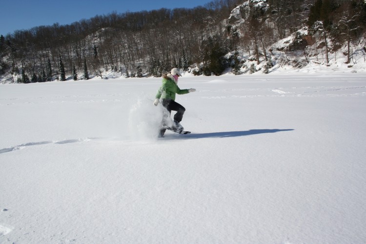 woman running in the snow