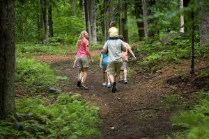 A family hiking at Smuggler's Notch Resort