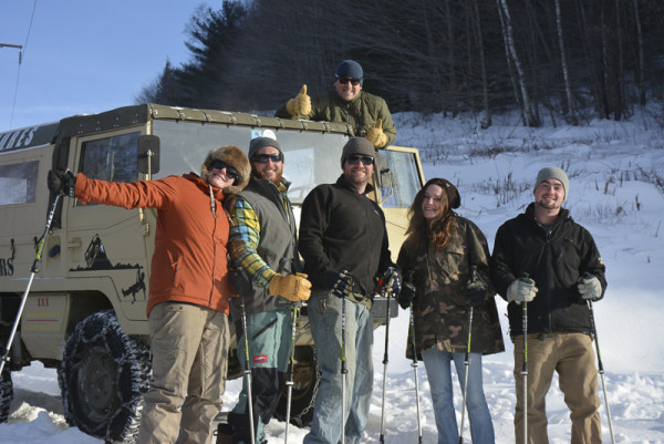 Backcountry snowshoers celebrate the end of an exhilarating hike, and look forward to the off-road trip back to town. 
