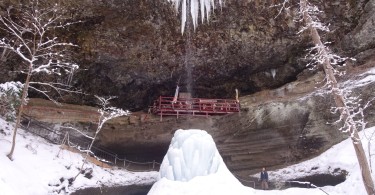 bridge under waterfall