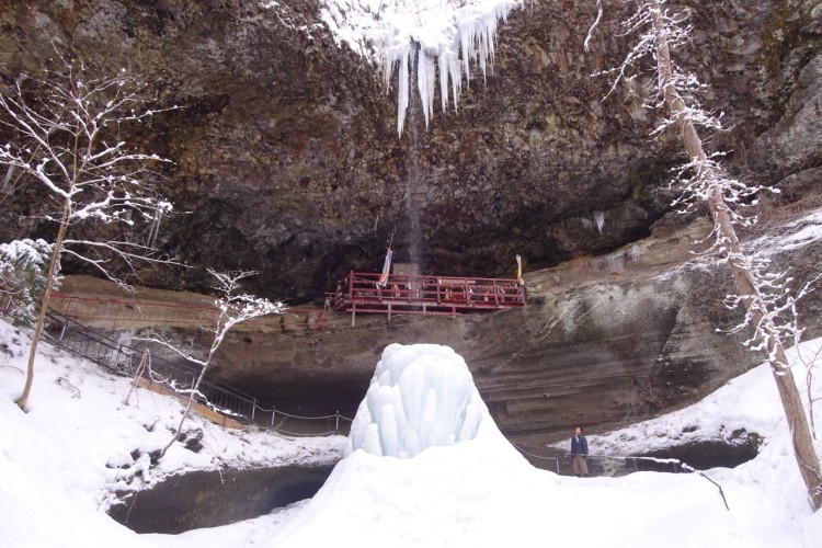 bridge under waterfall