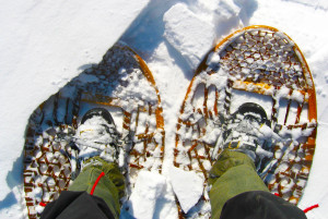 looking down at traditional snowshoes 