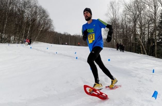 runner using TSL snowshoes