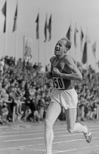 The incredible look of Zátopek in competition makes him easy to pick out on the track