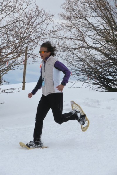 snowshoe racing, Judy Holmes wearing Maine Guide Snowshoes